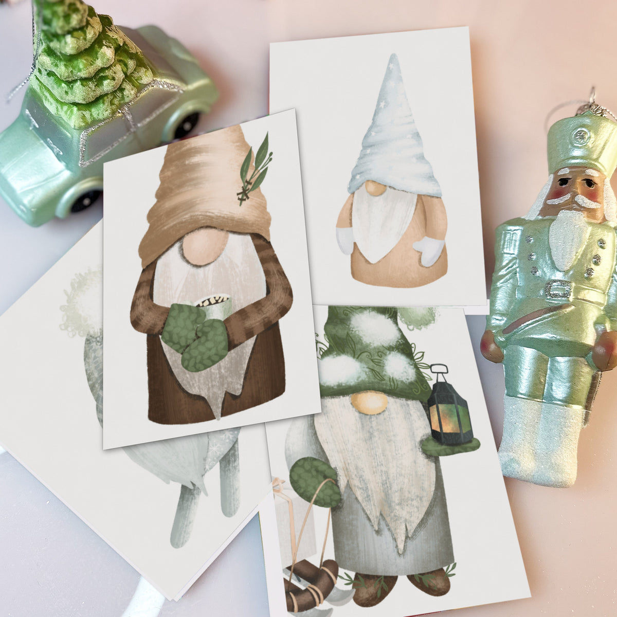 24-piece gnome card set, 12 watercolor-style designs with bearded tomtes on plain white backgrounds.
