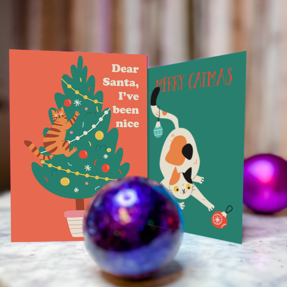 Humorous Christmas cards with cats in seasonal costumes and settings, 24 cards total.