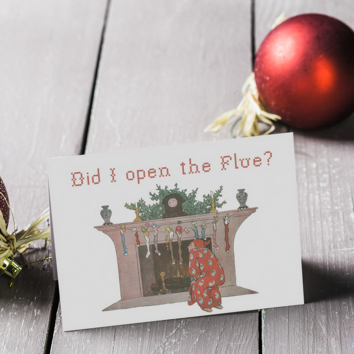 Flat cards in four designs; illustration palette includes red, pink, green, and multicolor stocking details.