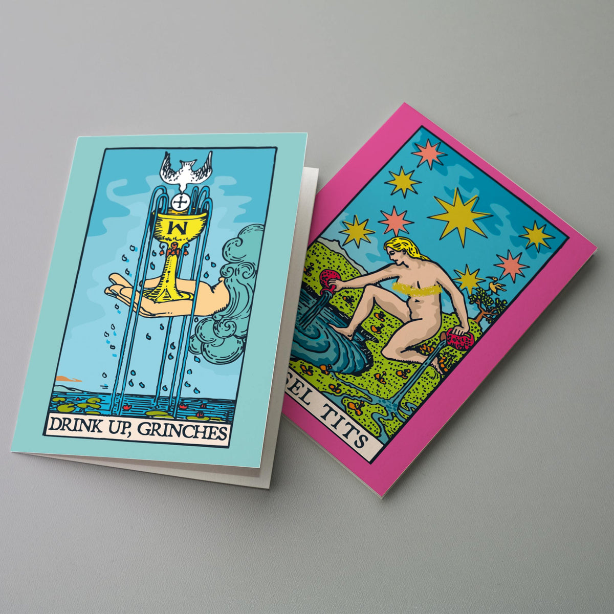 Set of 24 cards with six illustrated Christmas tarot parodies, each design repeated four times across the deck.