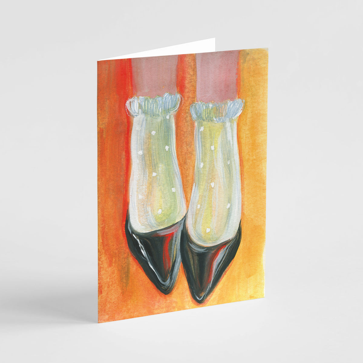24-piece notecard set with graphic abstract illustrations in bright reds, yellows, pinks, black, and white.