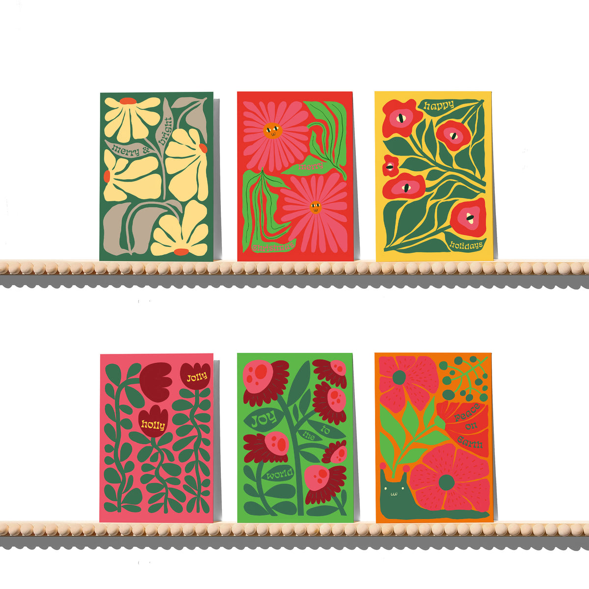 Set of 24 retro-style Christmas cards in six botanical designs with serif lettering on solid backgrounds.
