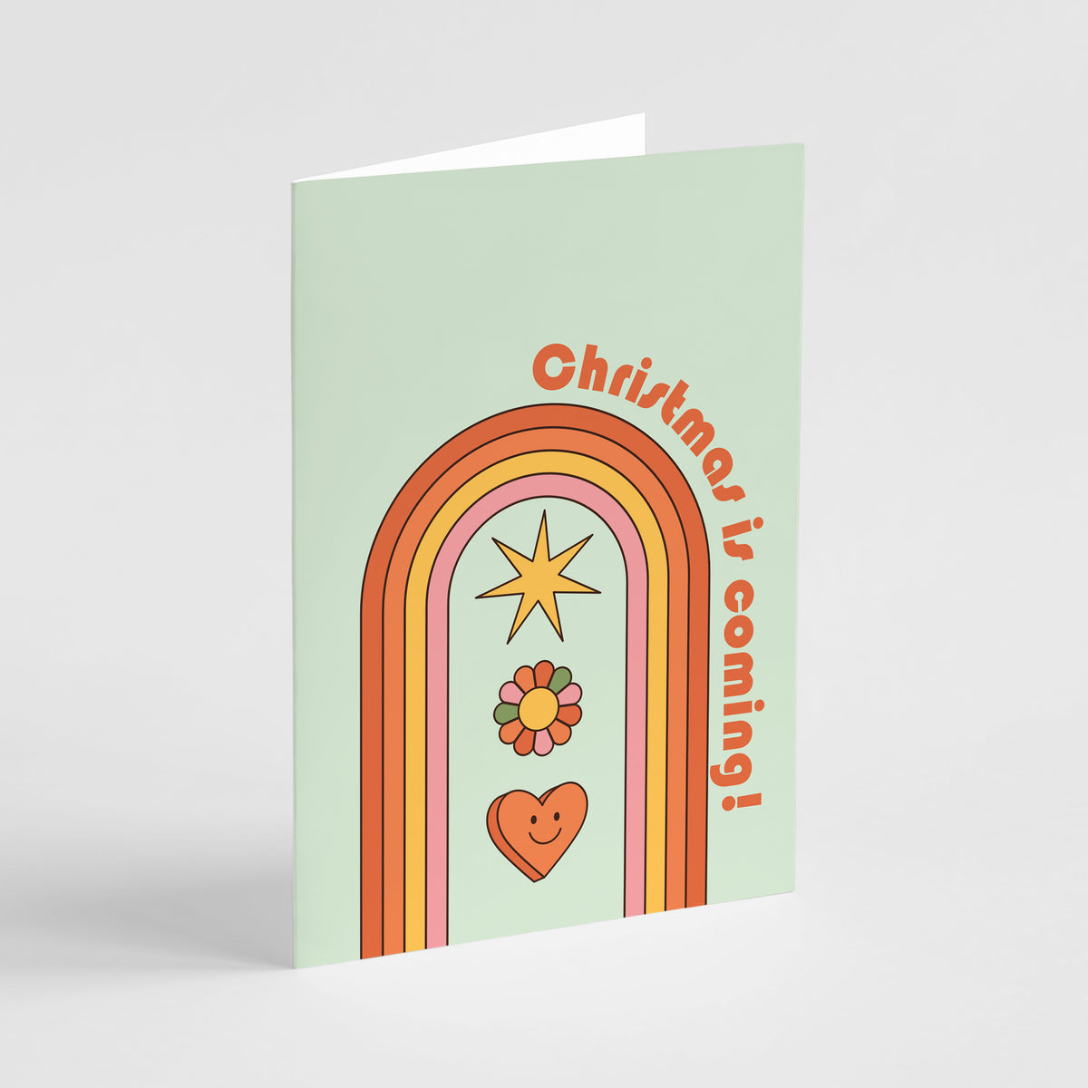 Retro Christmas card designs, 2 of each, with smiley faces, rainbows, flowers, and holiday lettering.
