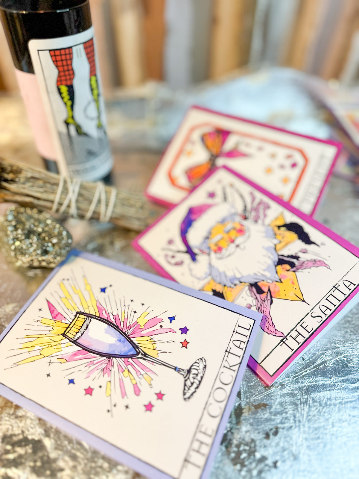 Christmas cards in a tarot style, subjects spanning food, figures, symbols, and seasonal objects.