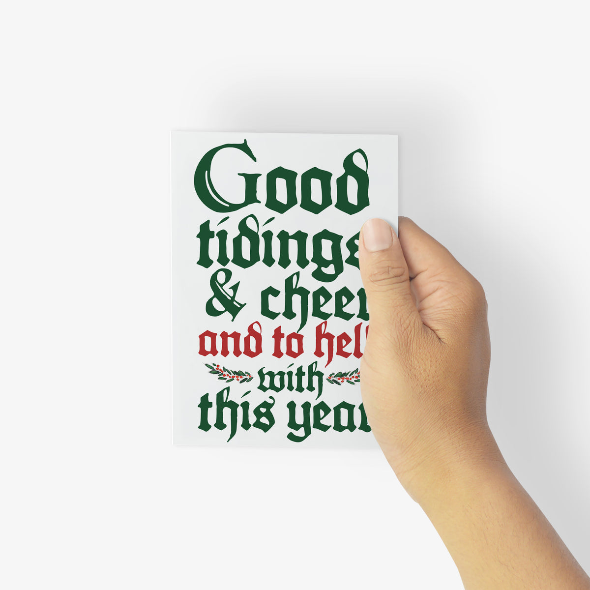 24-piece Christmas card set with bold humor phrases in white, red, cream, and black lettering.
