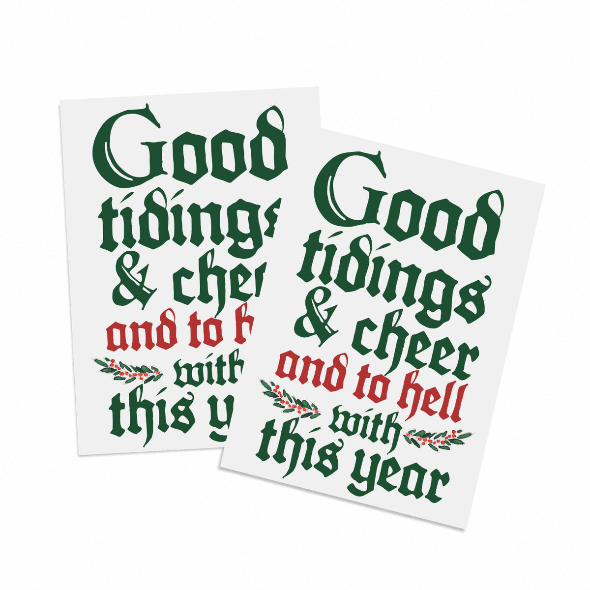 Holiday card with blackletter text reading "Good tidings & cheer and to hell with this year" in dark green and red.