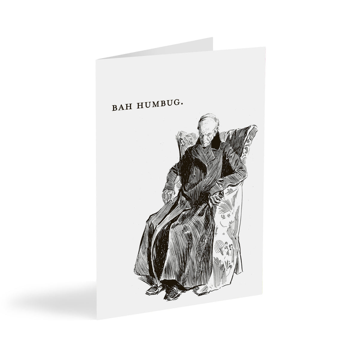 Bah Humbug Christmas card set of 24, black pen-and-ink illustration of a scowling elderly man in a wingback armchair.