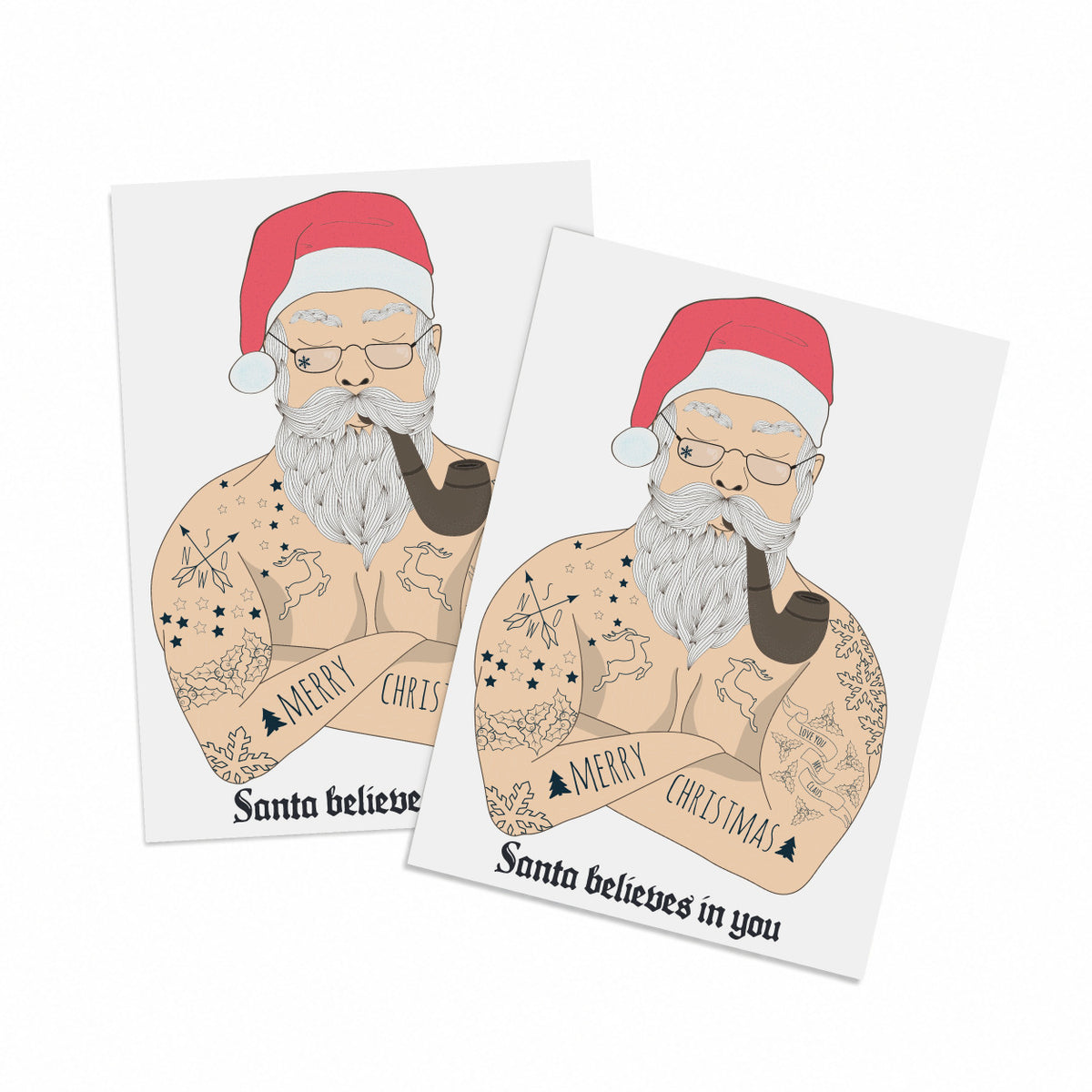 Tattooed Santa Christmas cards, set of 24, one illustrated design with blackletter caption reading Santa believes in you.
