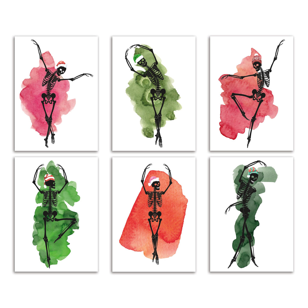 Boxed set of 24 Christmas cards featuring skeleton figures in ballet poses with watercolor splash backgrounds.