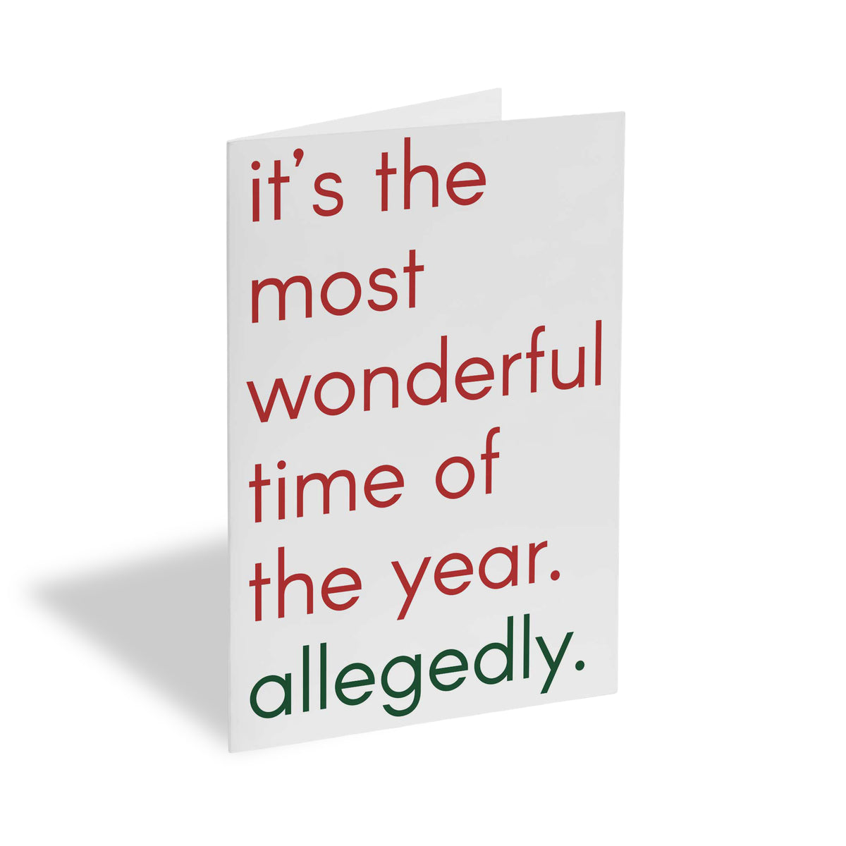 White Christmas card with red and green lowercase text reading "it's the most wonderful time of the year. allegedly."