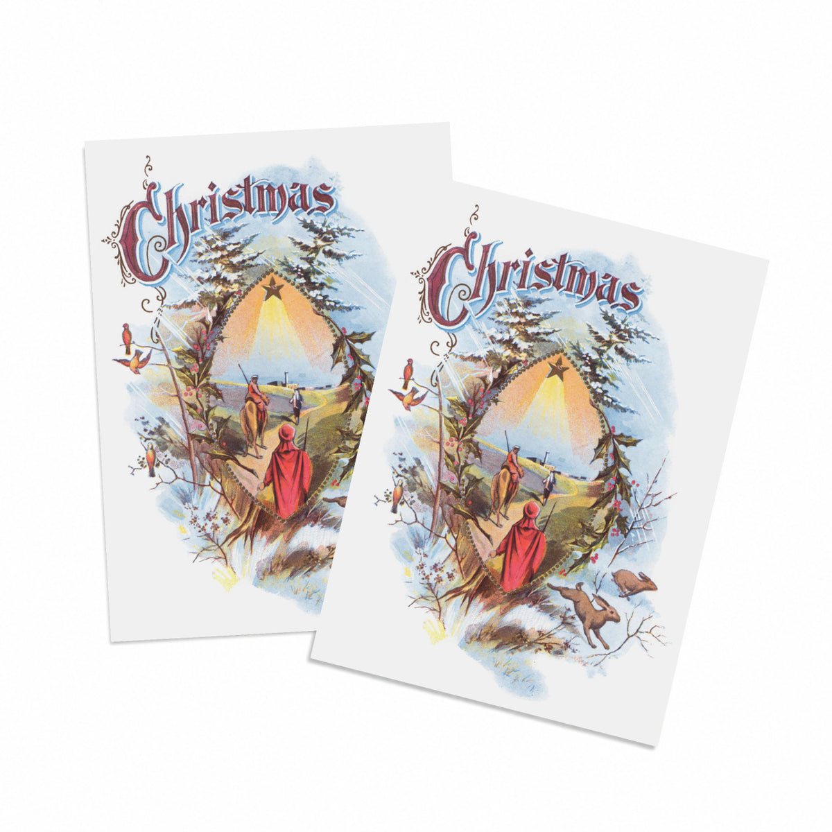 Vintage-style Christmas card with the three Magi following a star, framed by holly and snow-dusted firs, set of 24.