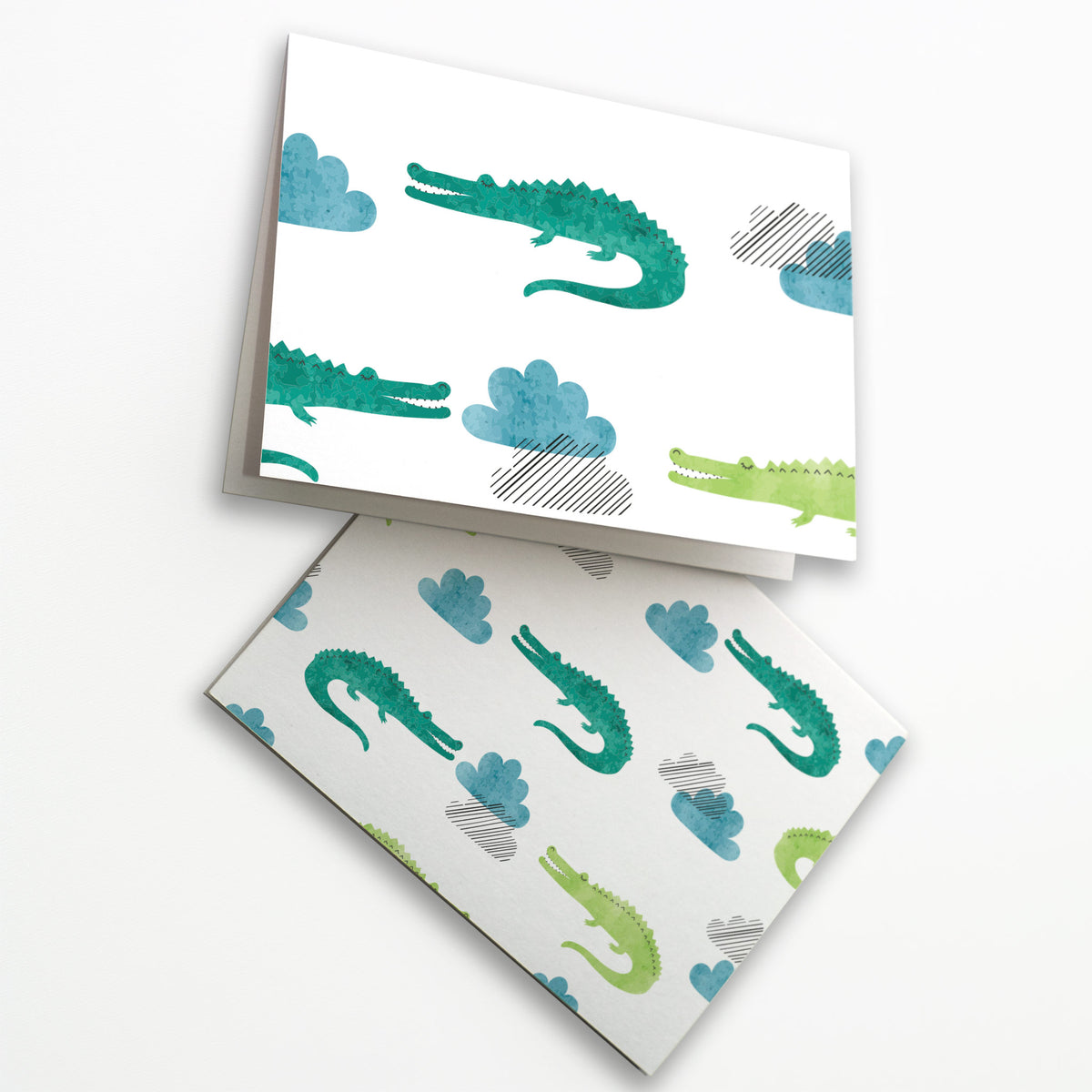 Boxed set of 24 encouragement cards featuring two crocodilian repeat-pattern designs on white.