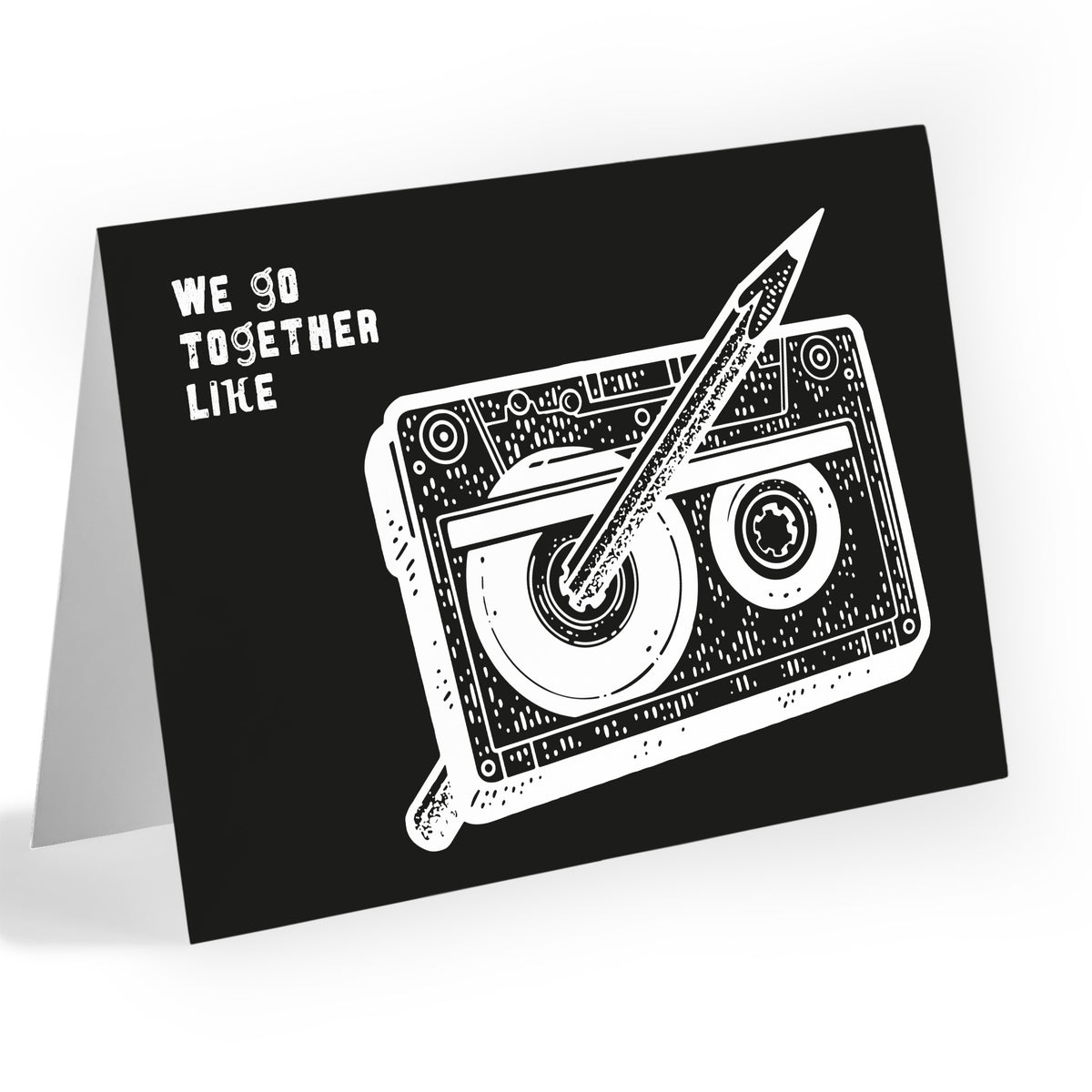 Black card with white line-art cassette tape and pencil illustration and the phrase "we go together like."