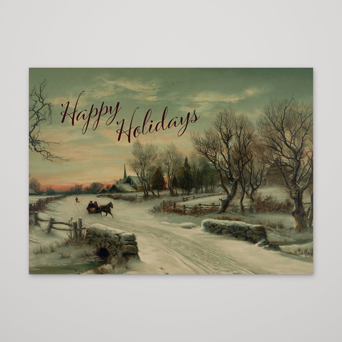 Card set featuring a 19th-century-style winter scene with a horse-drawn sleigh on a snowy country road.