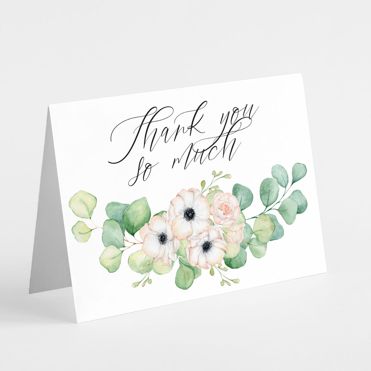 Floral thank you cards featuring handwritten-style script above blush roses and eucalyptus.