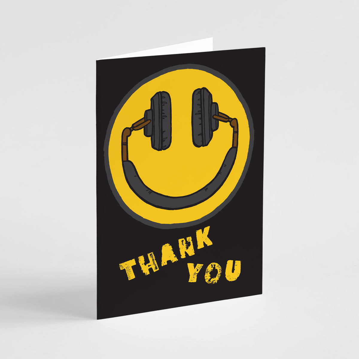 Yellow smiley face headphones graphic with bold distressed "THANK YOU" text on black thank you cards.