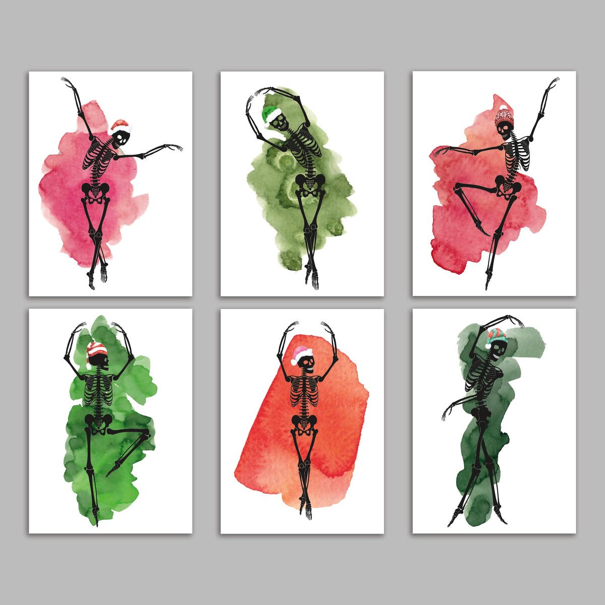 Set of 24 cards in 6 designs, each showing a black line skeleton dancer wearing a santa hat over a color splash.