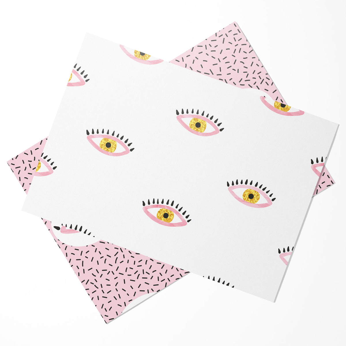 Set of 24 notecards with two alternating illustrated eye designs in pink, white, yellow, and black.