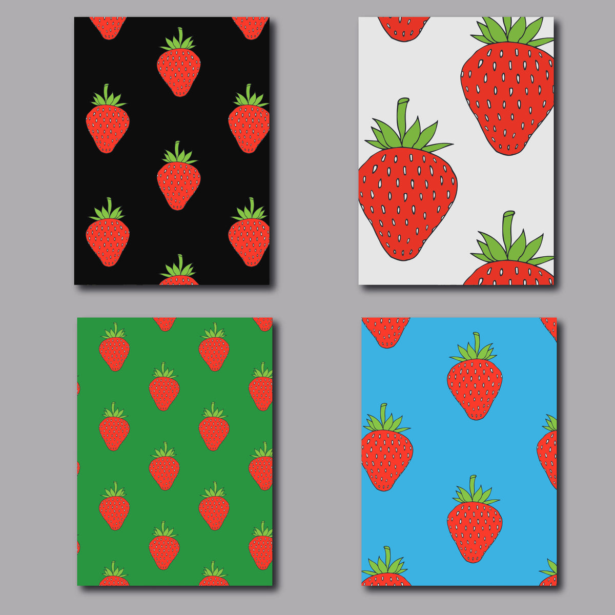 Set of 24 blank notecards featuring red strawberry illustrations on solid color backgrounds.