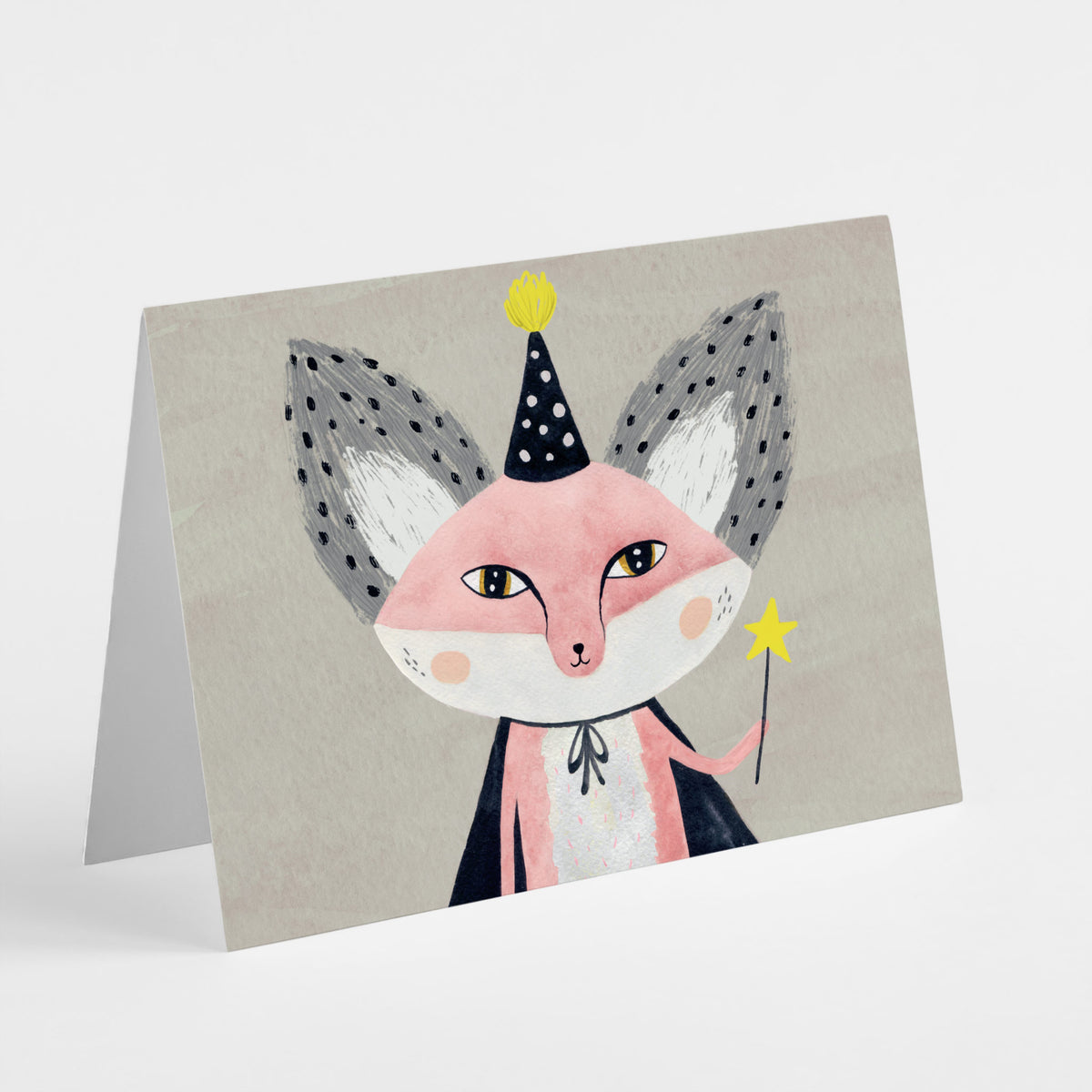 Card set with a watercolor fox character wearing a navy polka-dot hat and cape, holding a yellow star wand.