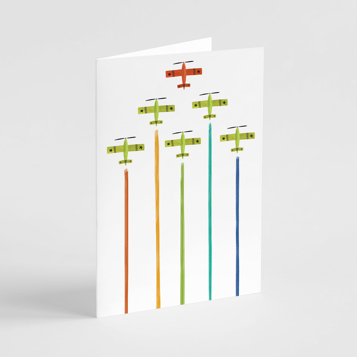 Flat graphic illustration of airshow planes with rainbow smoke trails on a white card background.