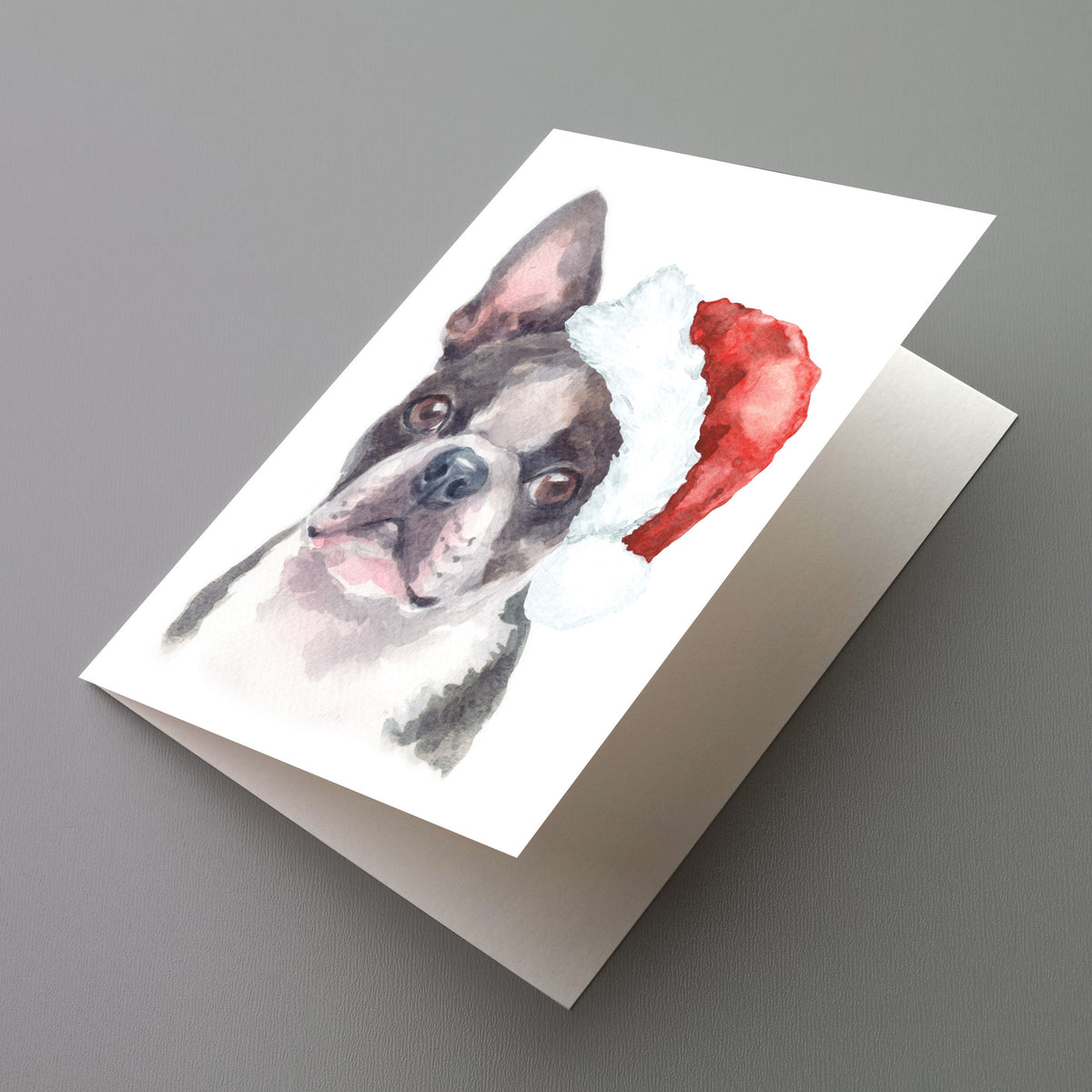 Watercolor Boston Terrier wearing a red cone hat with white cuff and pompom, set of 24 cards.