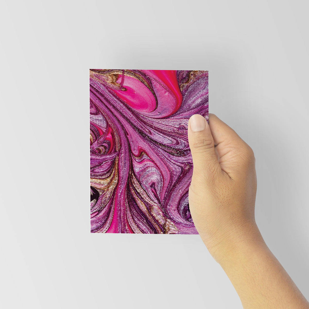 Card set featuring full-bleed marbled artwork in pink, purple, gold, and white.