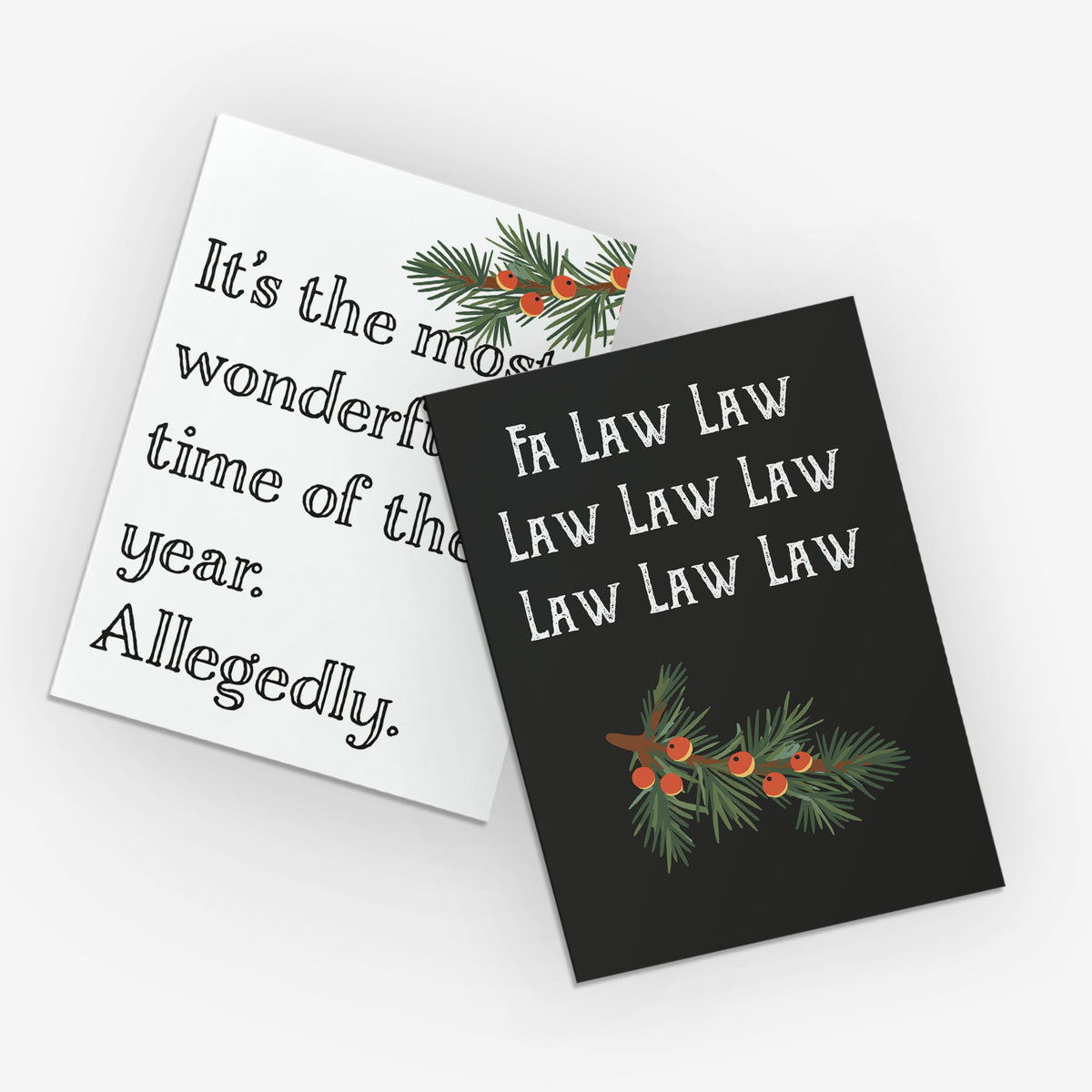 Card set featuring two designs with pine branch and red berry illustrations on black and off-white backgrounds.