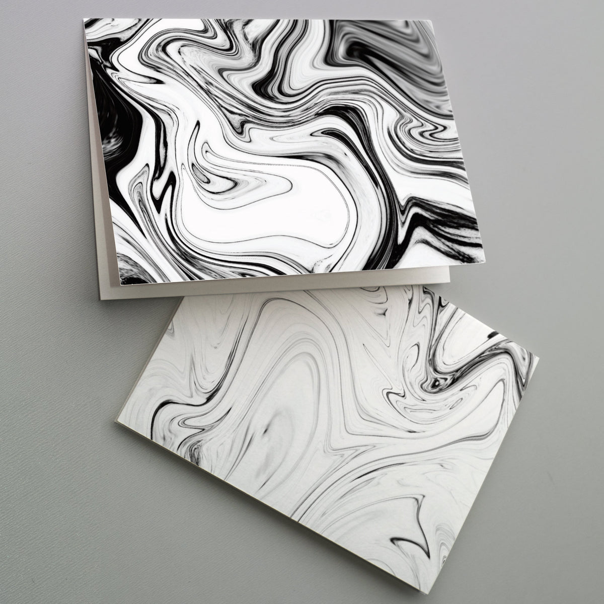 Set of 24 note cards featuring two paper marbling patterns in black, gray, and white.