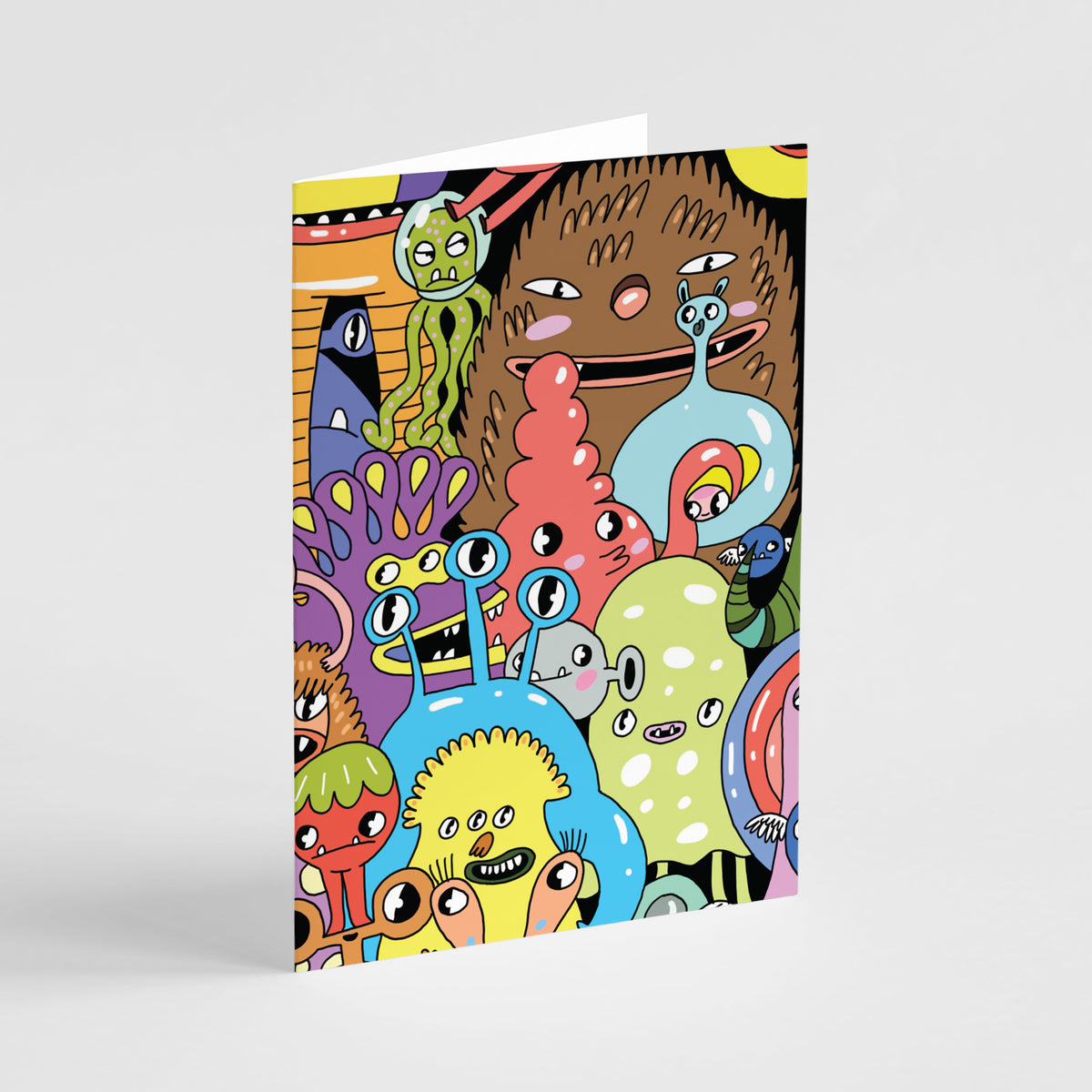 Card set featuring a dense, full-bleed illustration of cartoon monsters in bright, saturated colors.
