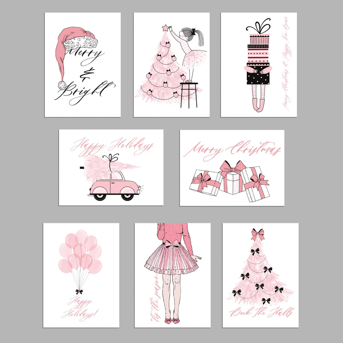 Set of 24 white cards with pink and black holiday motifs, eight designs repeated three times each.
