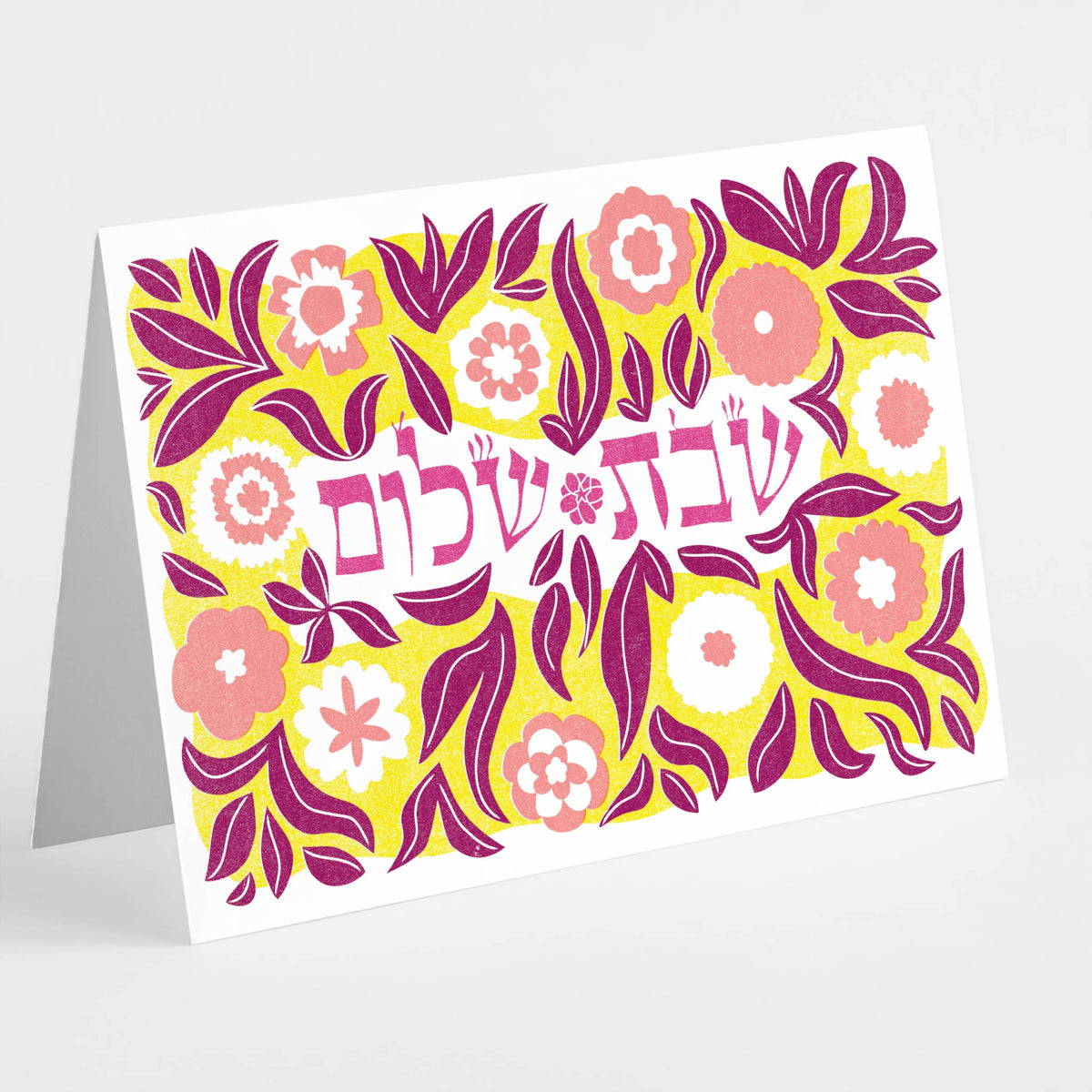 Card set printed with "שבת שלום" in stylized Hebrew lettering surrounded by dense botanical motifs.