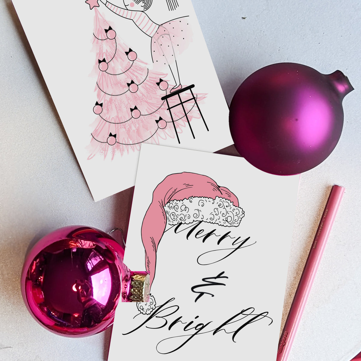 Holiday card set featuring eight illustrated designs in pink, black, and white with script phrases.