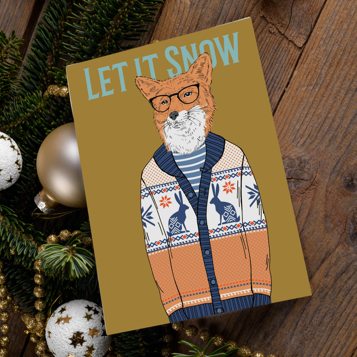 Christmas cards with illustrated wolf, bear, fox, deer, rabbit, and deer in patterned knit sweaters and glasses.