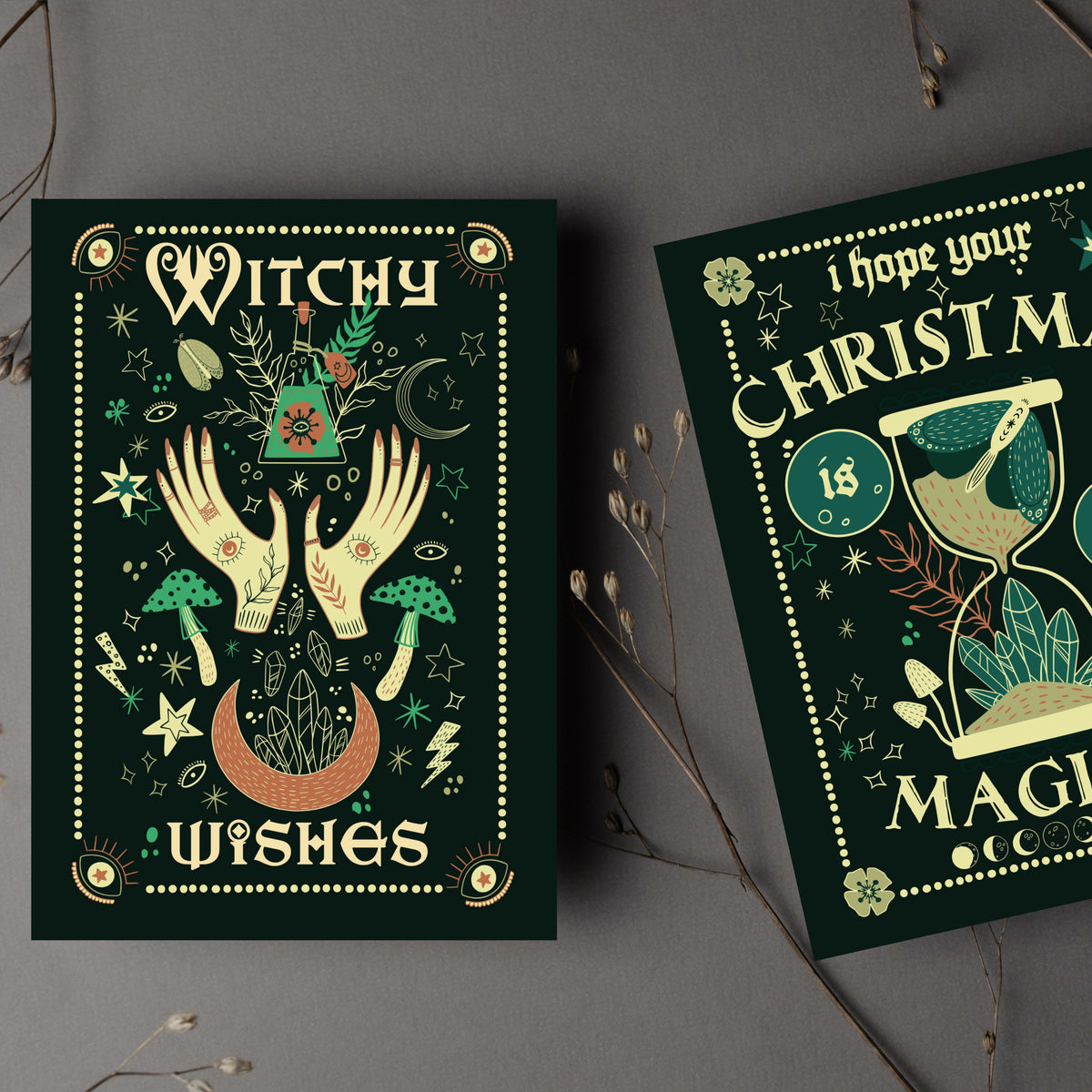 Card set featuring gothic blackletter and serif lettering on dark green cards with moon phase border details.