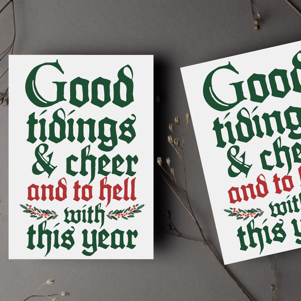 Single-design holiday card set, 24 count, blackletter text on white with green and red holly detail.