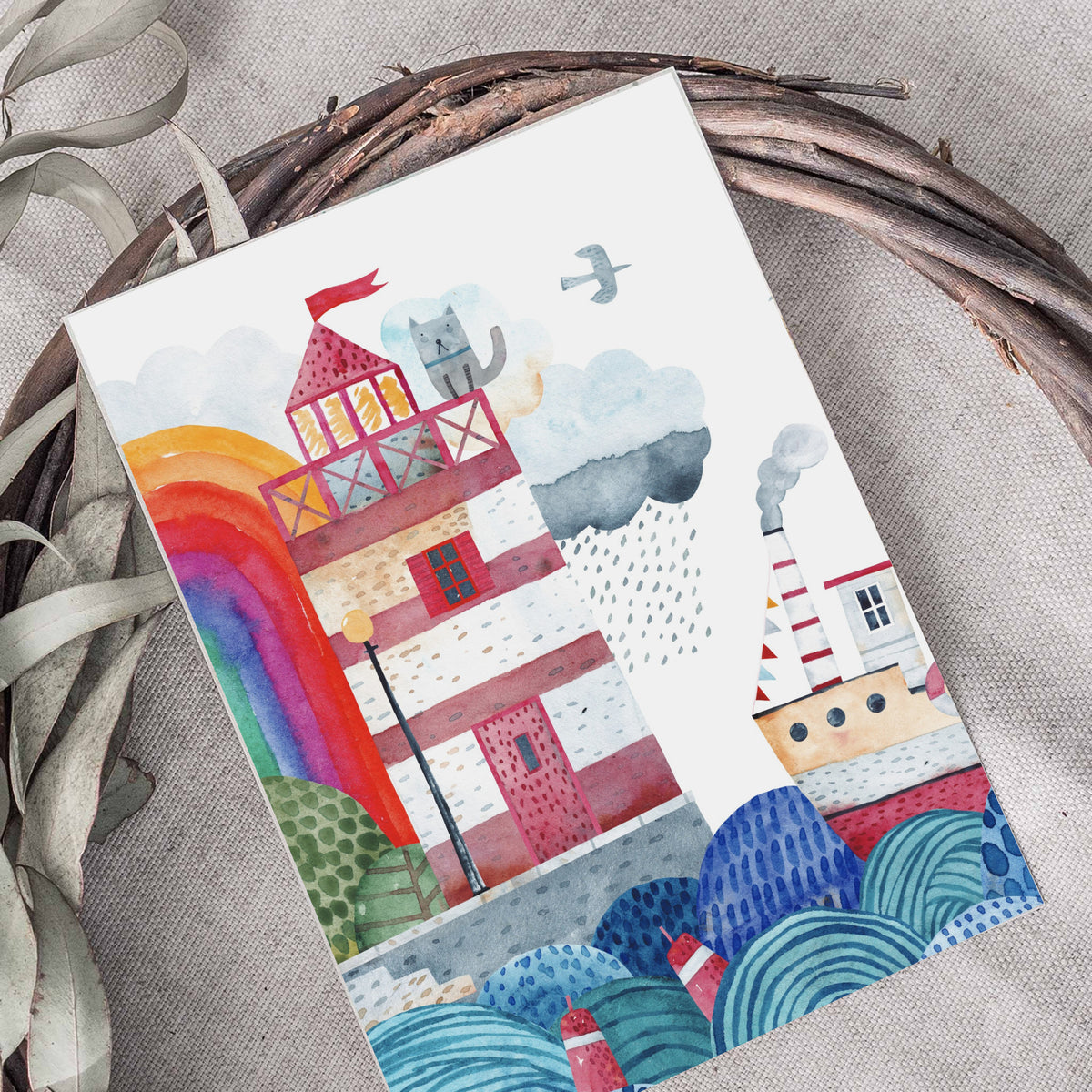 Card set with a full-bleed illustration of a red-and-cream banded lighthouse on a stone quay.