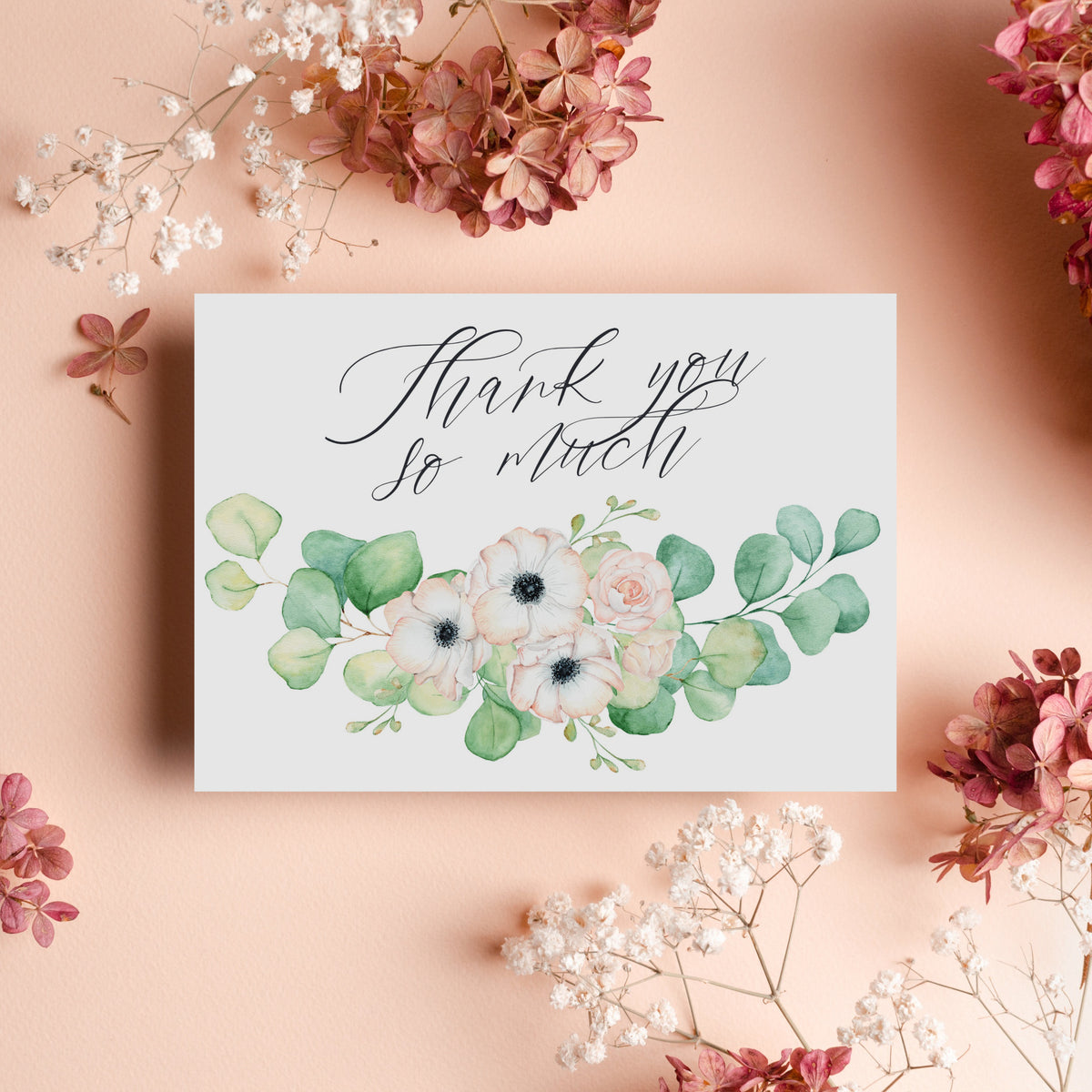 Set of 24 thank you notes with watercolor anemone and greenery illustration in soft blush tones.