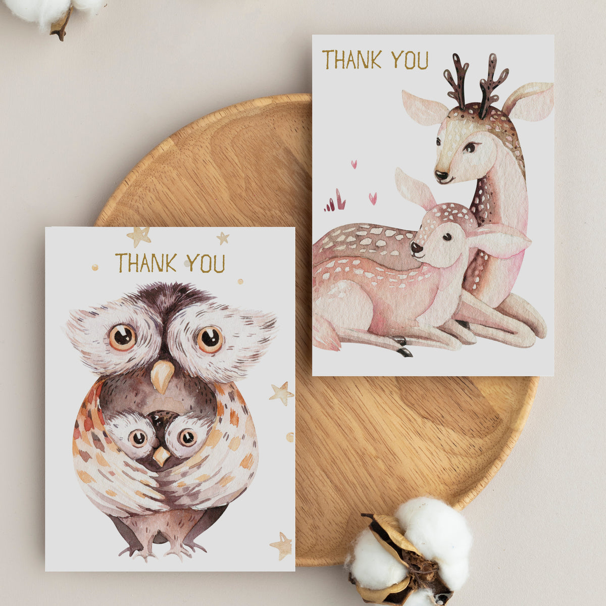Thank you card set with gold-colored text and illustrated woodland animal pairs including owl and deer.