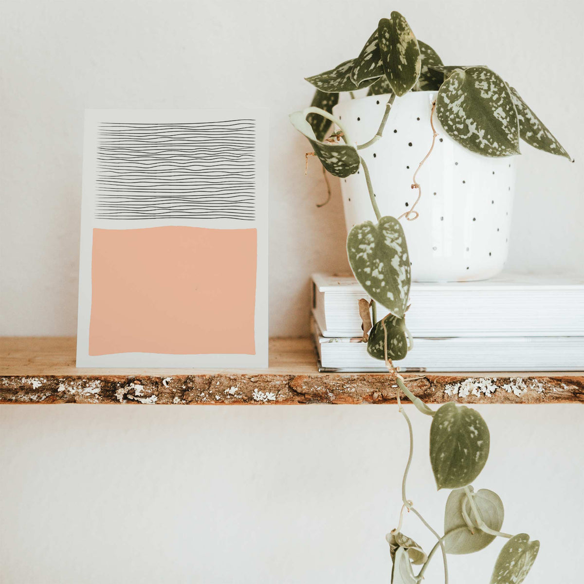 Card set with minimalist geometric designs in muted burgundy, maroon, gray, and off-white.