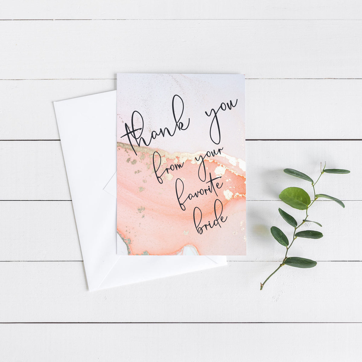 Portrait-oriented greeting card with centered handwritten-style script over a soft blush and peach marbled print.
