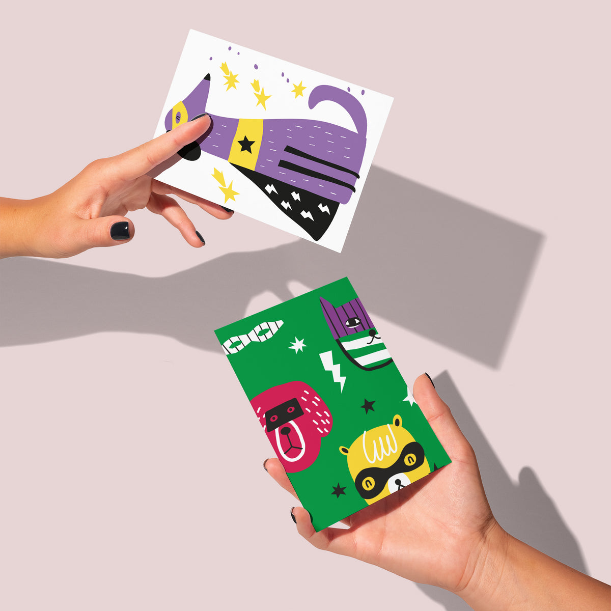 Superhero animal card set with stylized dog, bear, cat, monkey, and raccoon illustrations on bold graphic backgrounds.