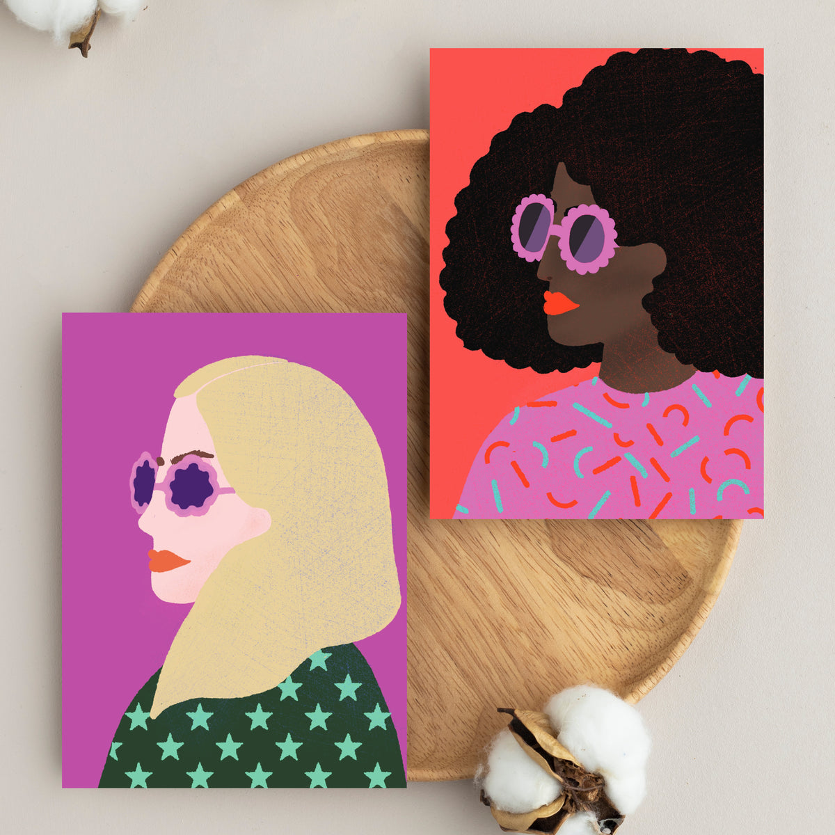 Four flat graphic bust portraits of women in side profile, each on a different solid background color.