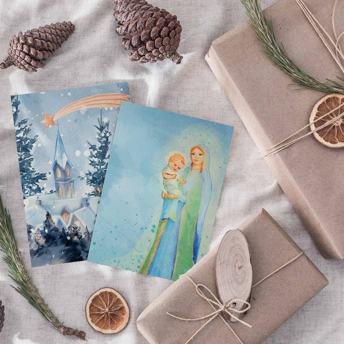 Set of 24 greeting cards featuring nativity, angel, candle, and winter church illustrations.