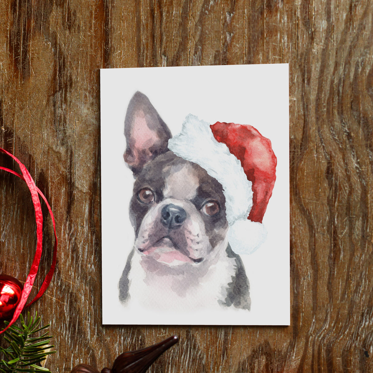 Card holiday set featuring a watercolor-style Boston Terrier portrait in a tipped red party hat.