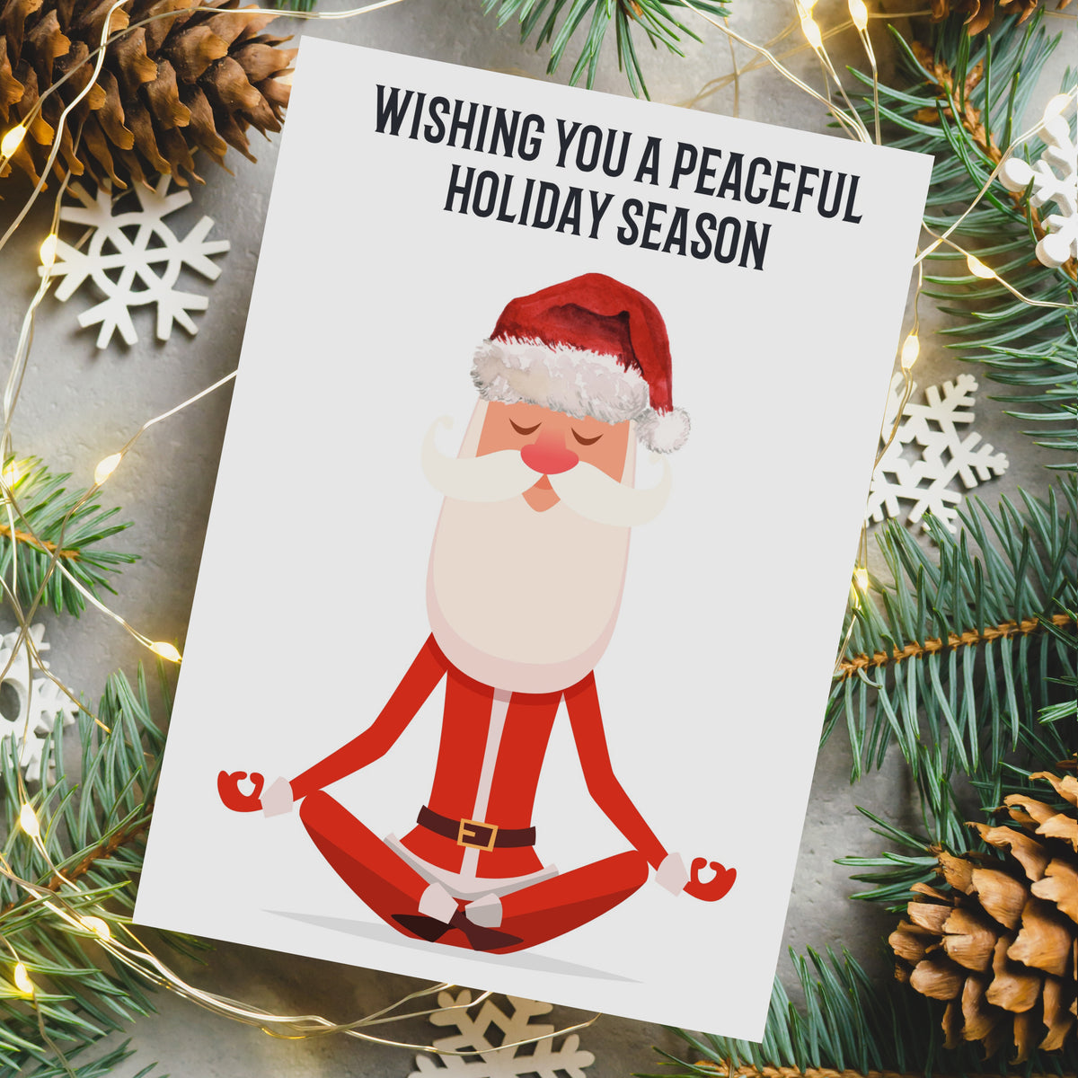 Set of 24 cards with a cartoon Santa in a meditation mudra gesture and the words "Wishing You a Peaceful Holiday Season."