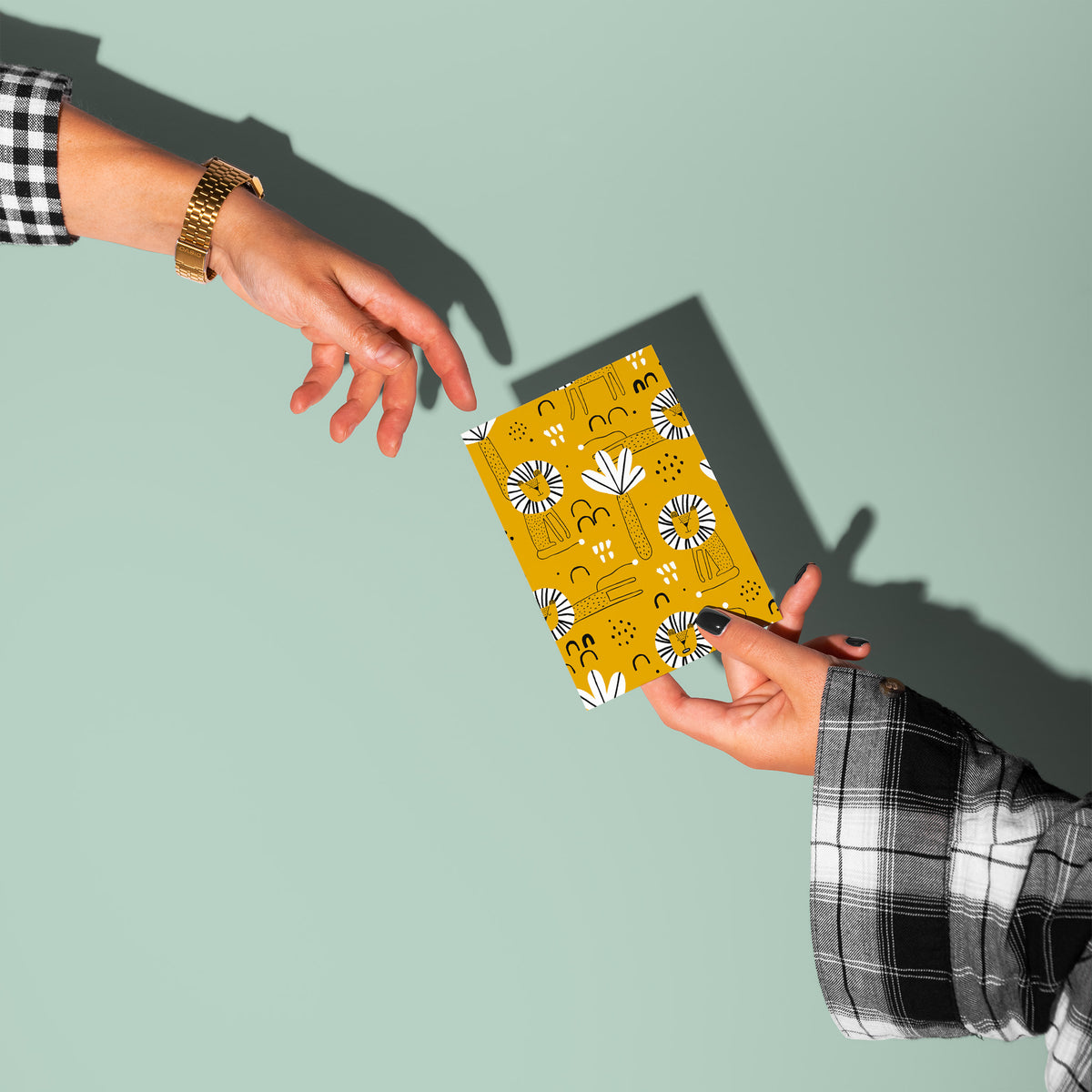 Set of 24 cards with flat illustrated lions in multiple poses on a full-bleed mustard yellow repeat pattern.