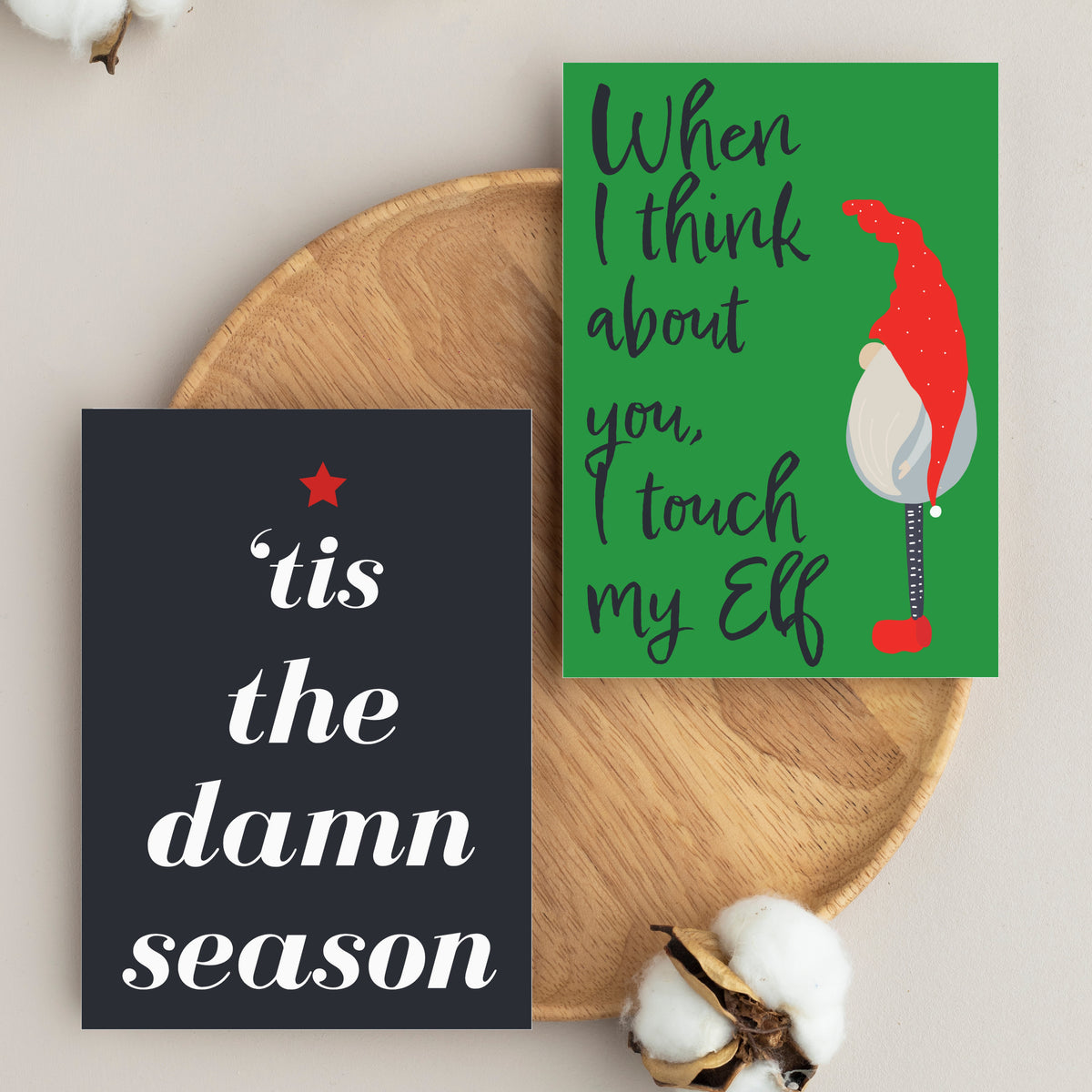 Christmas cards in 12 designs on red, green, black, and white backgrounds.