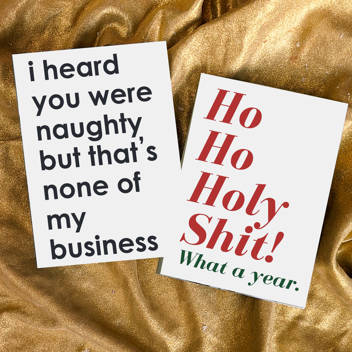 Holiday card set with 12 irreverent one-liner designs, including illustrated motifs and text-only styles.