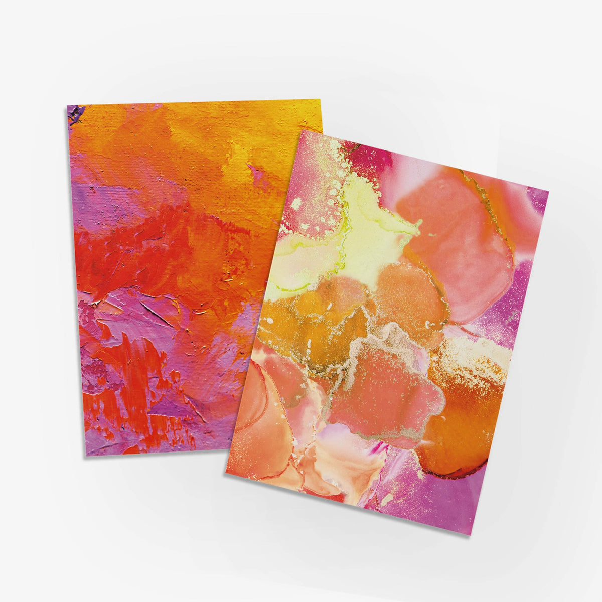 Colorful marbled notecard set of 24 with fluid abstract patterns in warm and cool tones.
